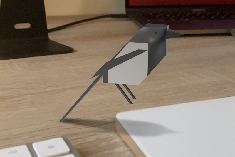 3d render of macpy3d mascotte on desk